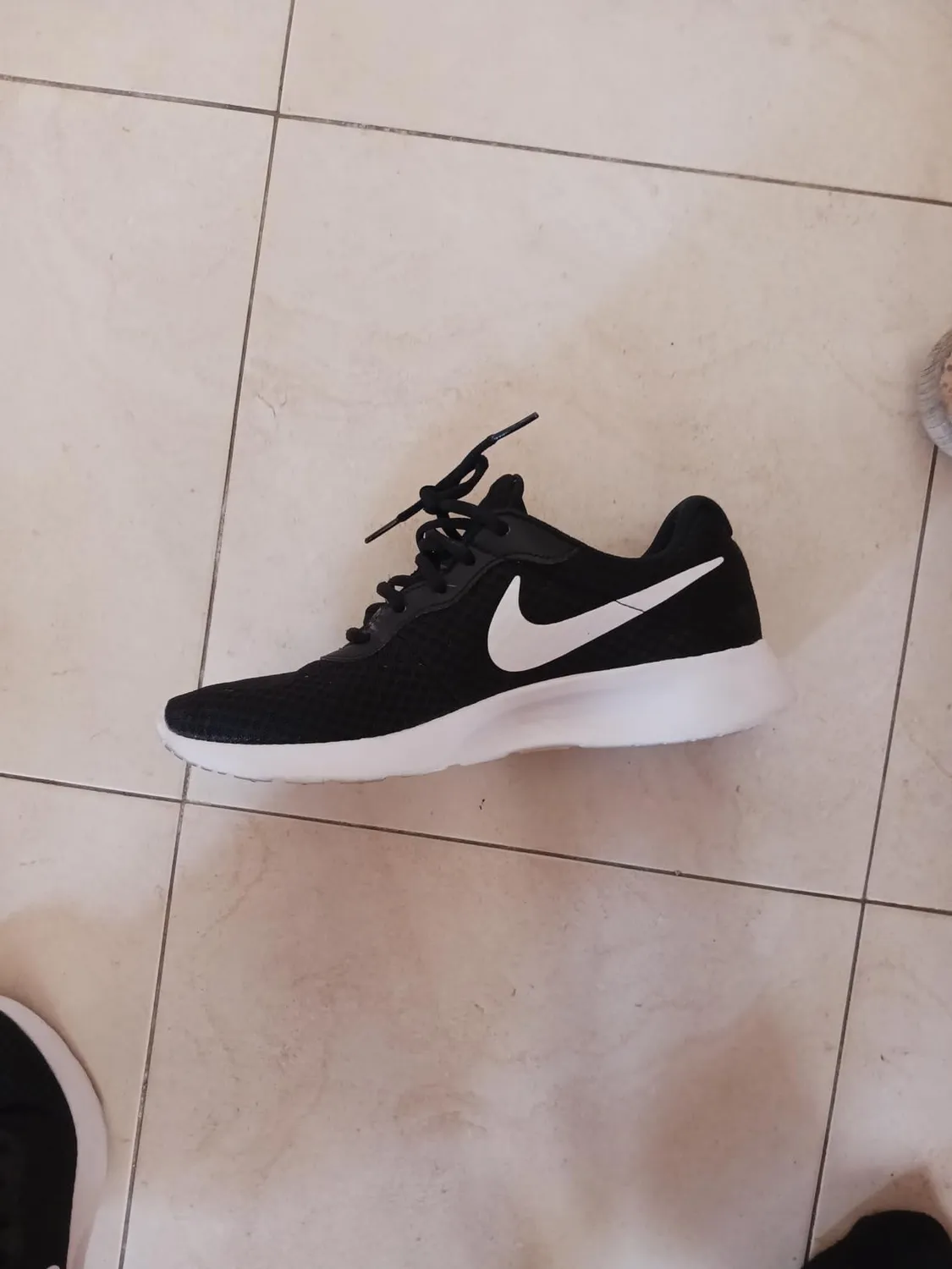 Nike Tanjun scarpe uomo 43 EU nero