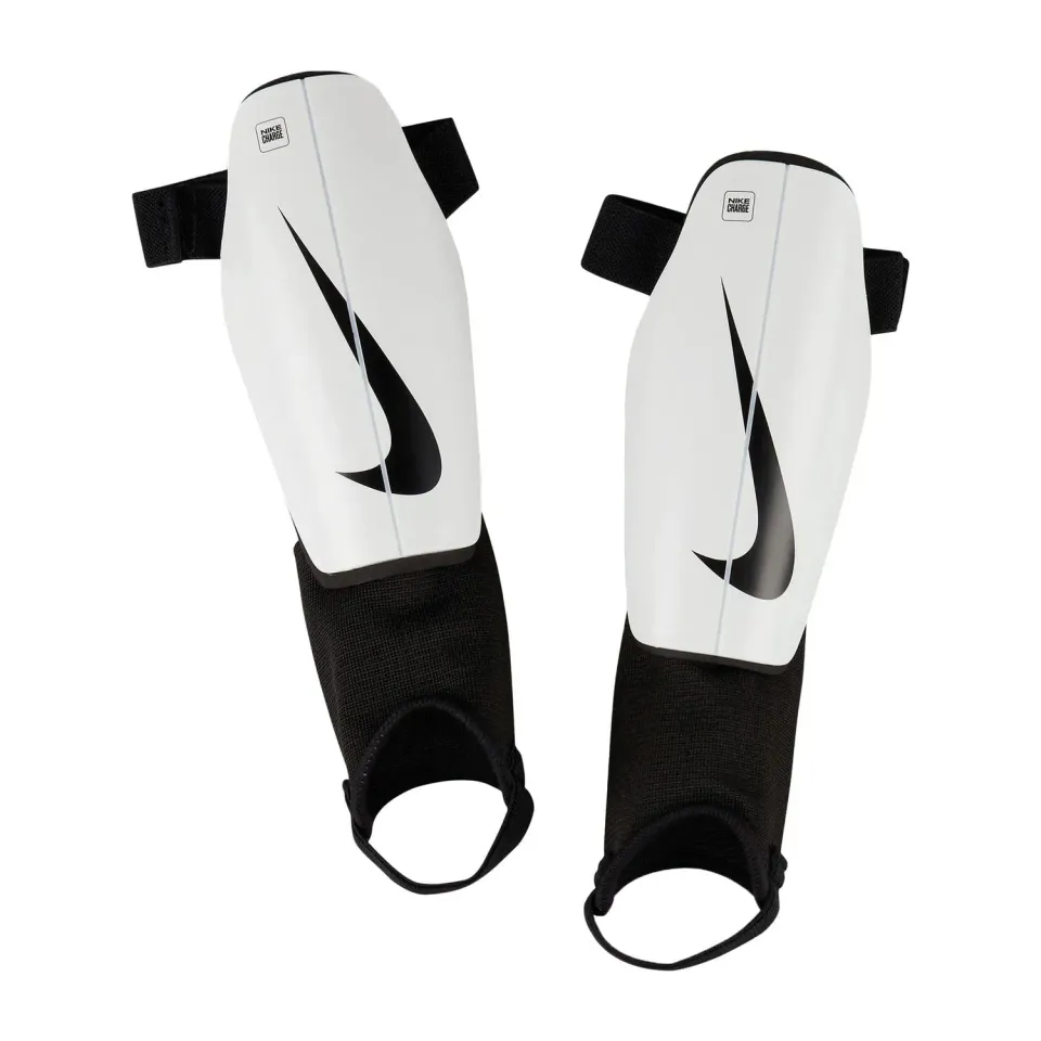 Nike Charge Guard parastinchi bimbi M bianco nero